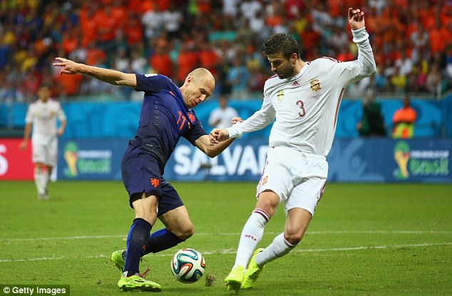 Robben easing past Pique before blasting it in. Spain 1-2 Netherlands.